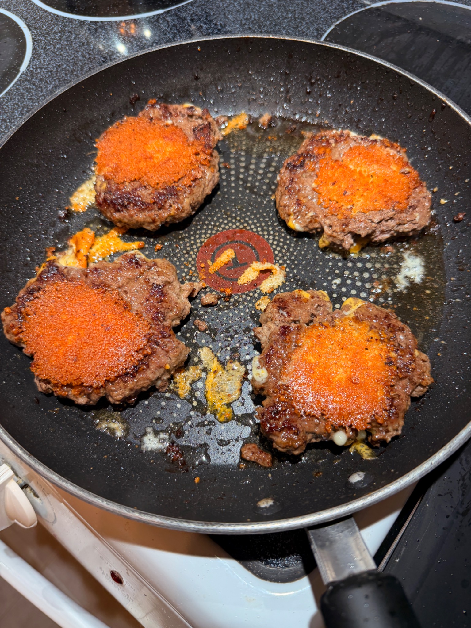 John's cheeseburgers with a crisp golden Parmesan crust