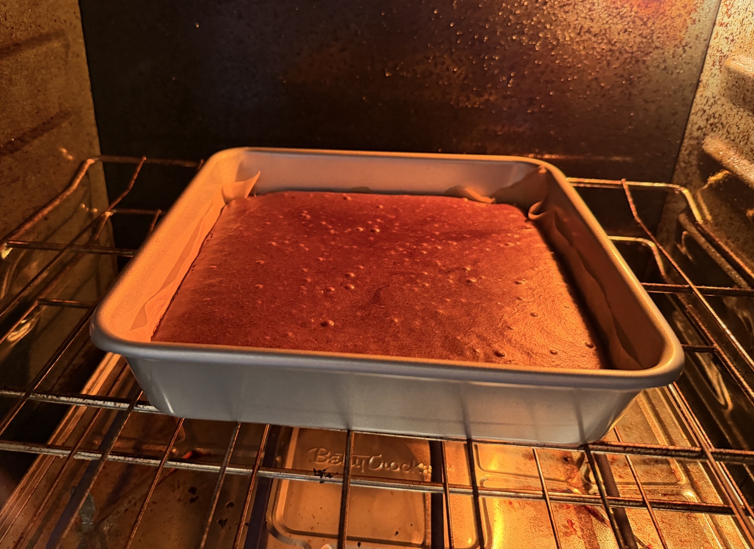 John's chocolate protein bars baking at 300 degrees Fahrenheit