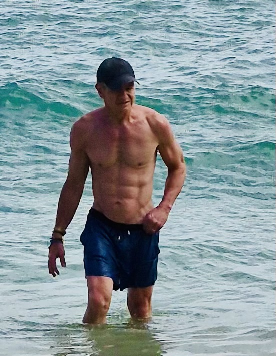 John walking out of the ocean